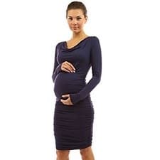 A woman wearing a Mama Cowl Neck Ruched Maternity Dress.