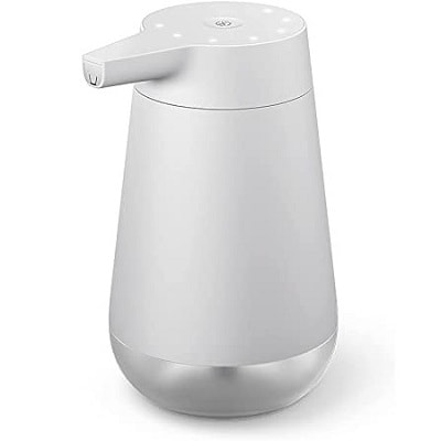 A white countertop soap dispenser
