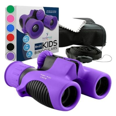 Purple kids' binoculars next to the package and a black carrying case