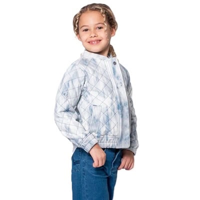 A girl wearing a stonewash light blue jacket and dark blue jeans