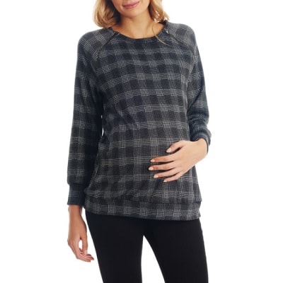 A woman wearing an Augusta Plaid Maternity/Nursing Pullover