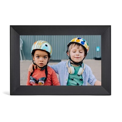 A digital photo frame displaying an image of two little kids 