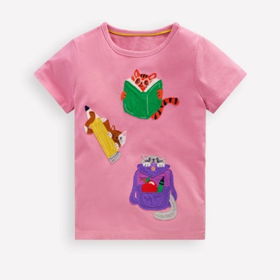 A pink t-shirt with colorful cat appliques
