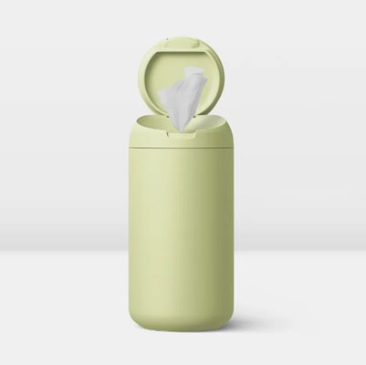 A light yellowish-green, tall wipes dispenser. The top is open with part of a white wipe sticking out.