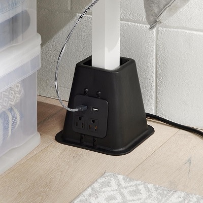 black bed riser with power outlet