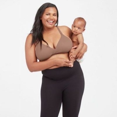 A woman wearing a Bra-llelujah! Mama Nursing Bra