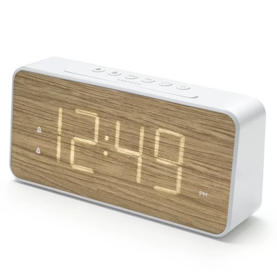 A woodgrain and white alarm clock reading "12:49"