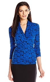 A woman in a blue Long Sleeve Naive Flower Wrap Top