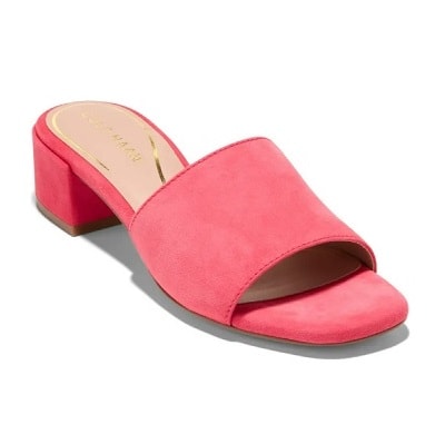 A coral slide-style sandal with a low heel