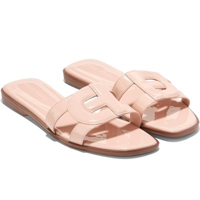 A pair of peach patent women's sandals