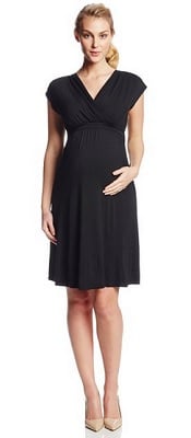 A woman in a Twinkle Maternity Dress