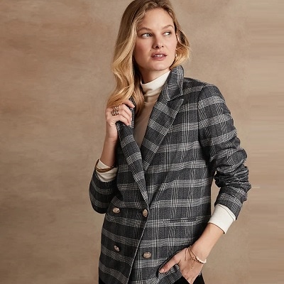 A lady with a plaid blazer