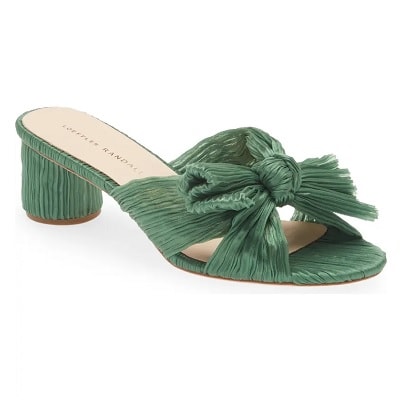 A green sandal made from green crinkled lamé, with a low heel