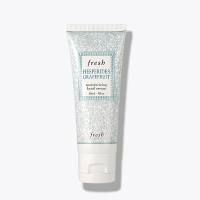 A tube of Fresh Hesperides Grapefruit Moisturizing Hand Cream