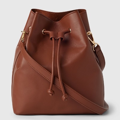 A brown vegan leather bucket bag