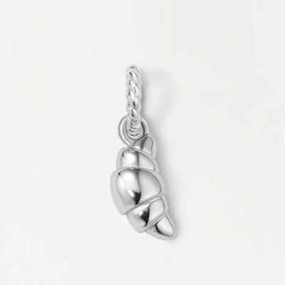 A silver croissant charm