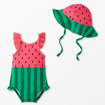 A watermelon-themed baby sun hat and swimsuit