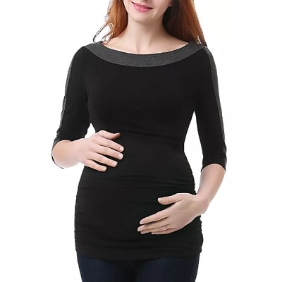 A woman wearing a black Isabel Color-Block Maternity Top