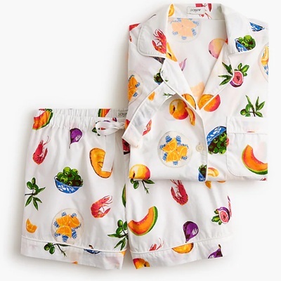 A pajama shorts set with a print of brightly colored foods