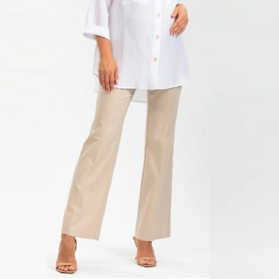 A woman wearing a white blouse, tan maternity pants, and sandals