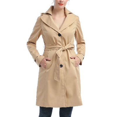 A woman wearing light brown trench coat