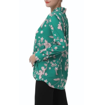 woman wearing green floral print blouse