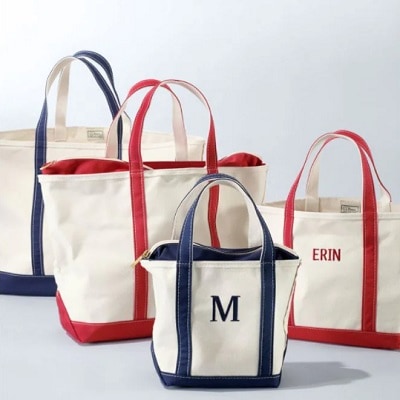 four tote bags in blue and red colors