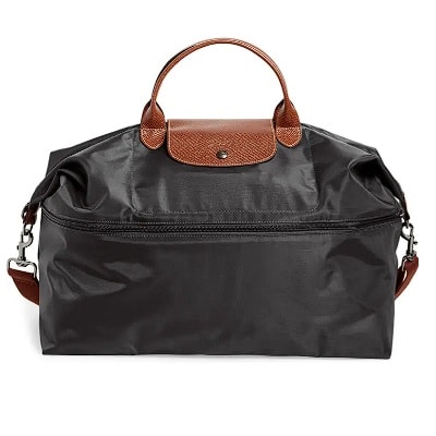 black bag with brown leather handle