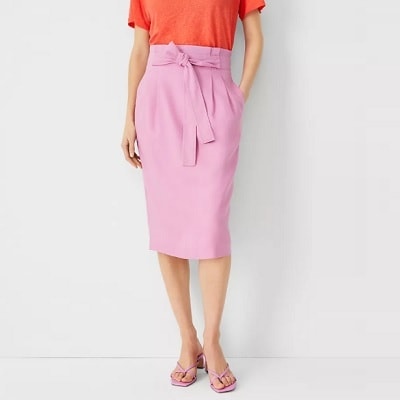 Woman wearing a pink Linen-Blend Tie-Waist Paperbag Pencil Skirt