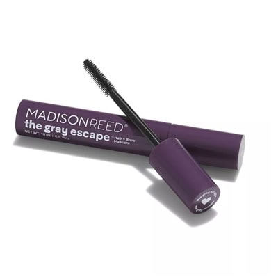 An open tube of Madison Reed's hair mascara