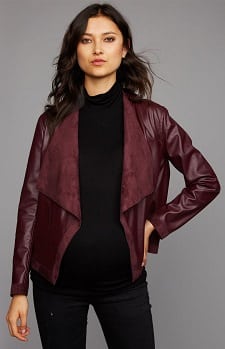 A woman wearing a Drape Front Reversible Maternity Jacket