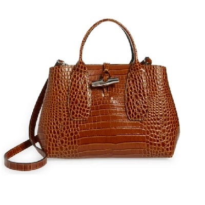 A rich medium brown crocodile print tote with a long strap and top handle