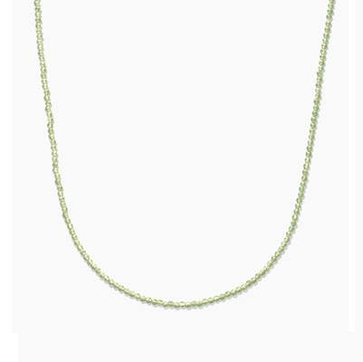 A light green beaded necklace with small beads