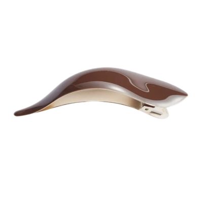 A brown hairclip with gold-tone metal