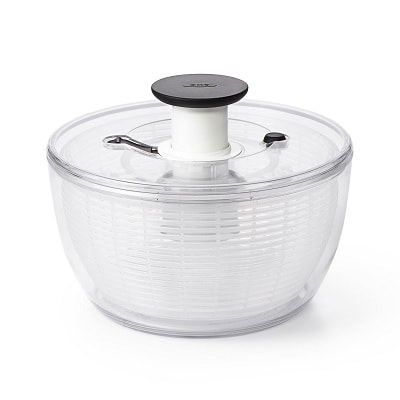A white salad spinner on a white background
