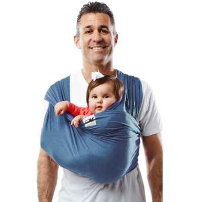 man carrying infant on blue baby carrier