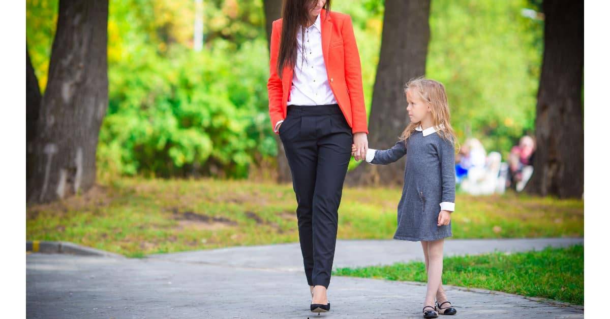 A mother and daughter walking together