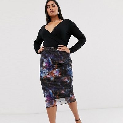 A woman wearing a Mesh Midi Skirt in Galaxy Print