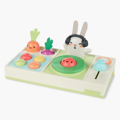 A toy set that looks like a DJ deck, with a white rabbit as the DJ