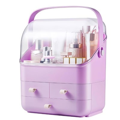 A light purple, plastic makeup organizer with drawers and a clear top, and several beauty products inside