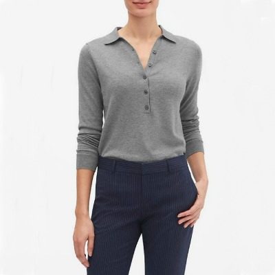 A woman wearing a Sweater Polo