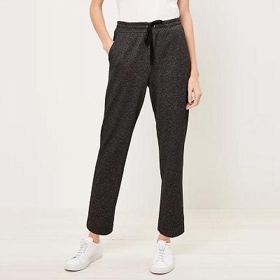 A woman wearing a Houndstooth Tapered Cargo Jogger