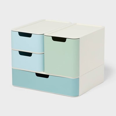 A toy storage cabinet with blue and green drawers