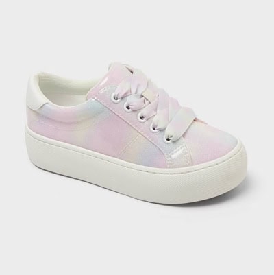 A kids' platform sneaker with blotches of pink, yellow, and light blue