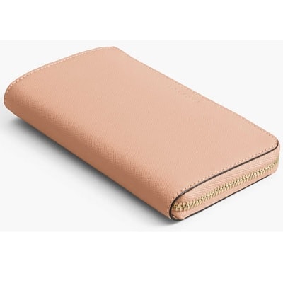 A cream-colored small leather wallet