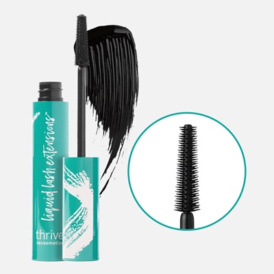 An open green tube of mascara next to a closeup of the applicator end