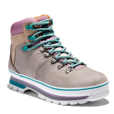 A multicolored hiking boot that's mostly gray, with blue shoelaces, a white sole, and purple and tan accents