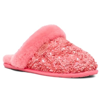 A pink slipper with a fuzzy top and sequins