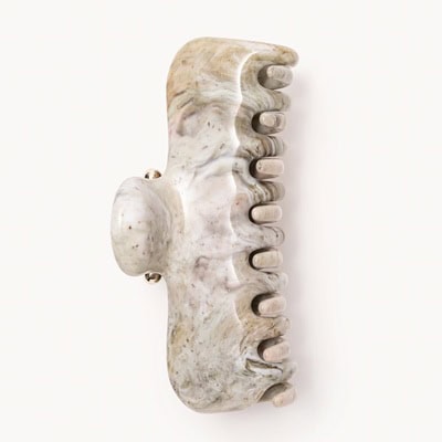 A claw hair clip with a marble finish