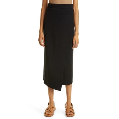 Woman wearing asymmetric overlap skirt